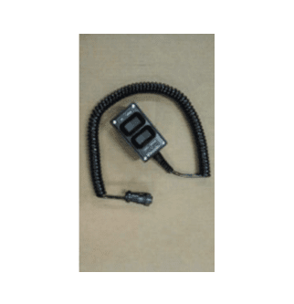 A digital display device with a coiled cord and connector, placed on a plain surface.